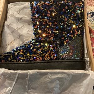 Brand new never worn sequenced black boots